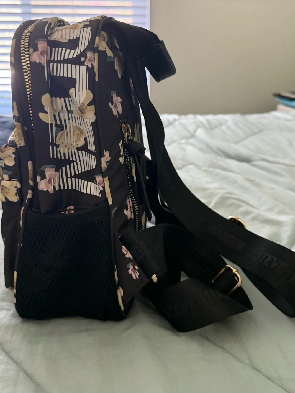 Steve Madden Black Floral Mini Backpack with Gold Accents